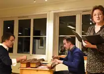 Poesiopplesing saman med musikarane Ole og Knut Aastad Bråten